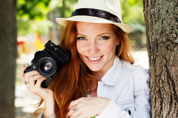 Nice girl photographer at work