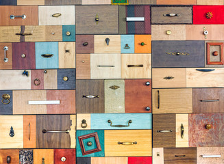 Various little colorful drawers - interior detail. - obrazy, fototapety, plakaty