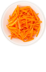 Chopped carrot in a bowl over white background