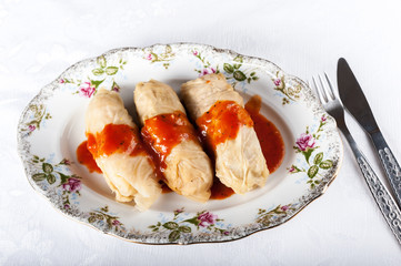 stuffed cabbage in tomato sauce - a dish of Polish cuisine