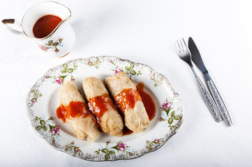 stuffed cabbage in tomato sauce - a dish of Polish cuisine