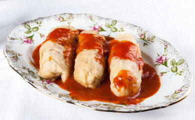 stuffed cabbage in tomato sauce - a dish of Polish cuisine