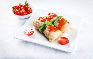 stuffed cabbage in tomato sauce - a dish of Polish cuisine