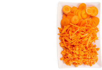 Different style of chopped carrots in a plate 