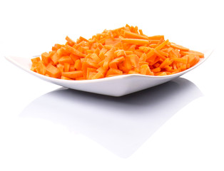 Different style of chopped carrots in a plate 