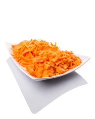 Different style of chopped carrots in a plate 