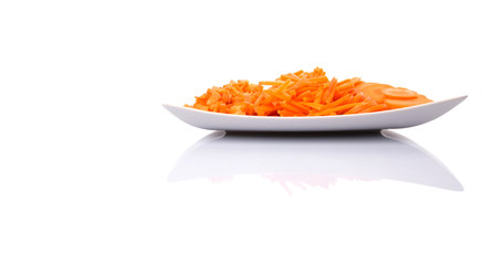 Different style of chopped carrots in a plate 