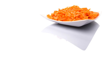 Different style of chopped carrots in a plate 