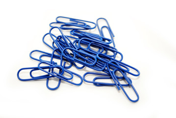 Blue Paper Clips on a White Background
