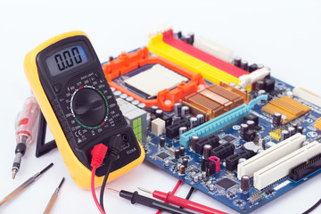 Digital Multimeter and motherboard