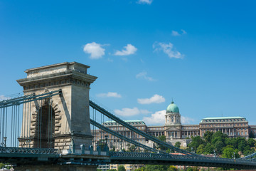 Obraz premium Chain bridge Budapest Hungary with old castle palace in the back