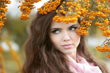 Beautiful woman autumn portrait, colorful park. Outdoor.