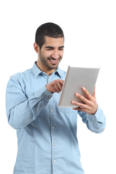 Arab man browsing a tablet reader with finger