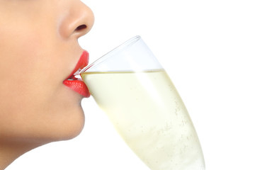 Woman lips with red lipstick drinking champagne