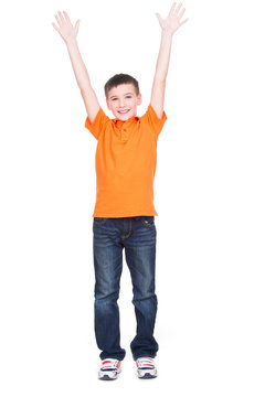 Happy boy with raised hands up.