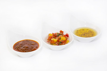 sauces on a white background in the restaurant