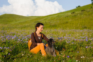 Girl walking with a dog