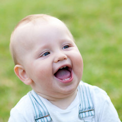 Happy adorable little boy outdoors