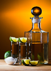 gold tequila with salt and lime