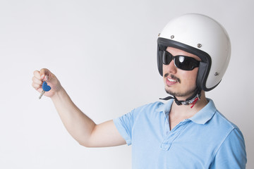 A men holding a motorcycle keys