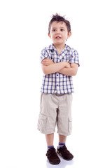 Portrait of  beautiful little boy standing with arms crossed on