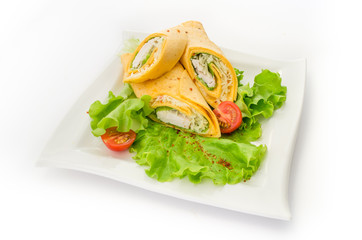 fresh  tortilla wraps with vegetables on the plate