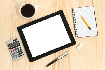 Tablet PC, cup of coffee with office supplies 