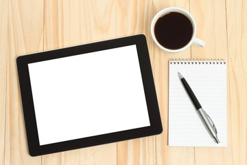Tablet PC, cup of coffee with office supplies 