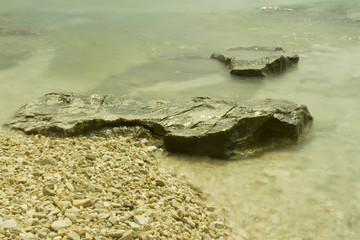 rocks in blur water