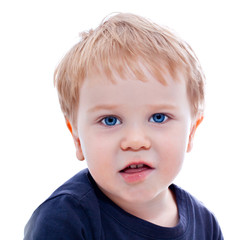 Toddler blond and blue eyes boy child with various facial expres