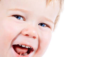 Toddler blond and blue eyes boy child with various facial expres