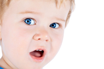 Toddler blond and blue eyes boy child with various facial expres
