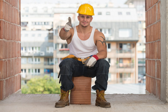 Happy Caucasian Construction Worker Giving Thumb Up