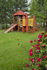 Fototapeta na wymiar wooden children playground in park