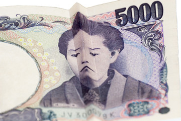 Sad face on Japanese bill