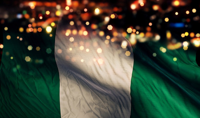 Nigeria National Flag Light Night Bokeh Abstract Background - obrazy, fototapety, plakaty
