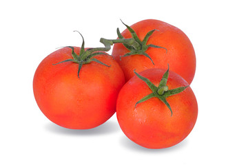 Tomato with drops isolated on white background
