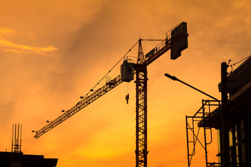 silhouette of building construction  on evening