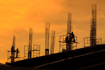 silhouette of building construction  on evening