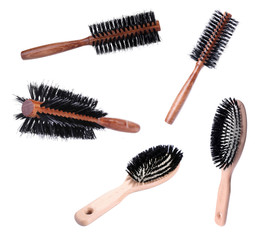 Collage of wooden hairbrushes isolated on white