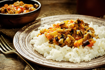 rice with sauce of eggplant, peppers and tomatoes