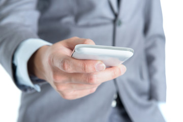 Businessman using smart phone.