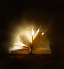 Magical book on bright background