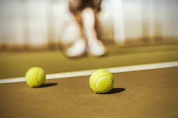 Foto auf Acrylglas tennis balls on court © Myst