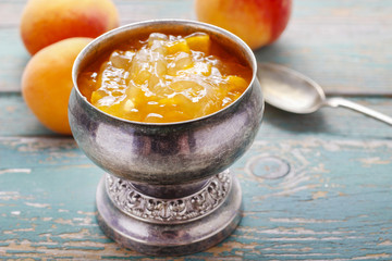 Vintage silver goblet of peach jam