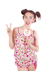 Fototapeta na wymiar Portrait of laughing girl holding big lollipop