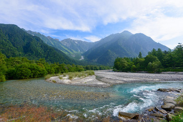 Fototapeta na wymiar Azusa river and Hotaka mountains in Kamikochi, Nagano, Japan