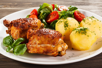 Grilled chicken legs with vegetables
