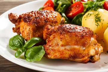 Grilled chicken legs with vegetables