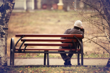 Fototapeta lonely man on the bench autumn, winter obraz